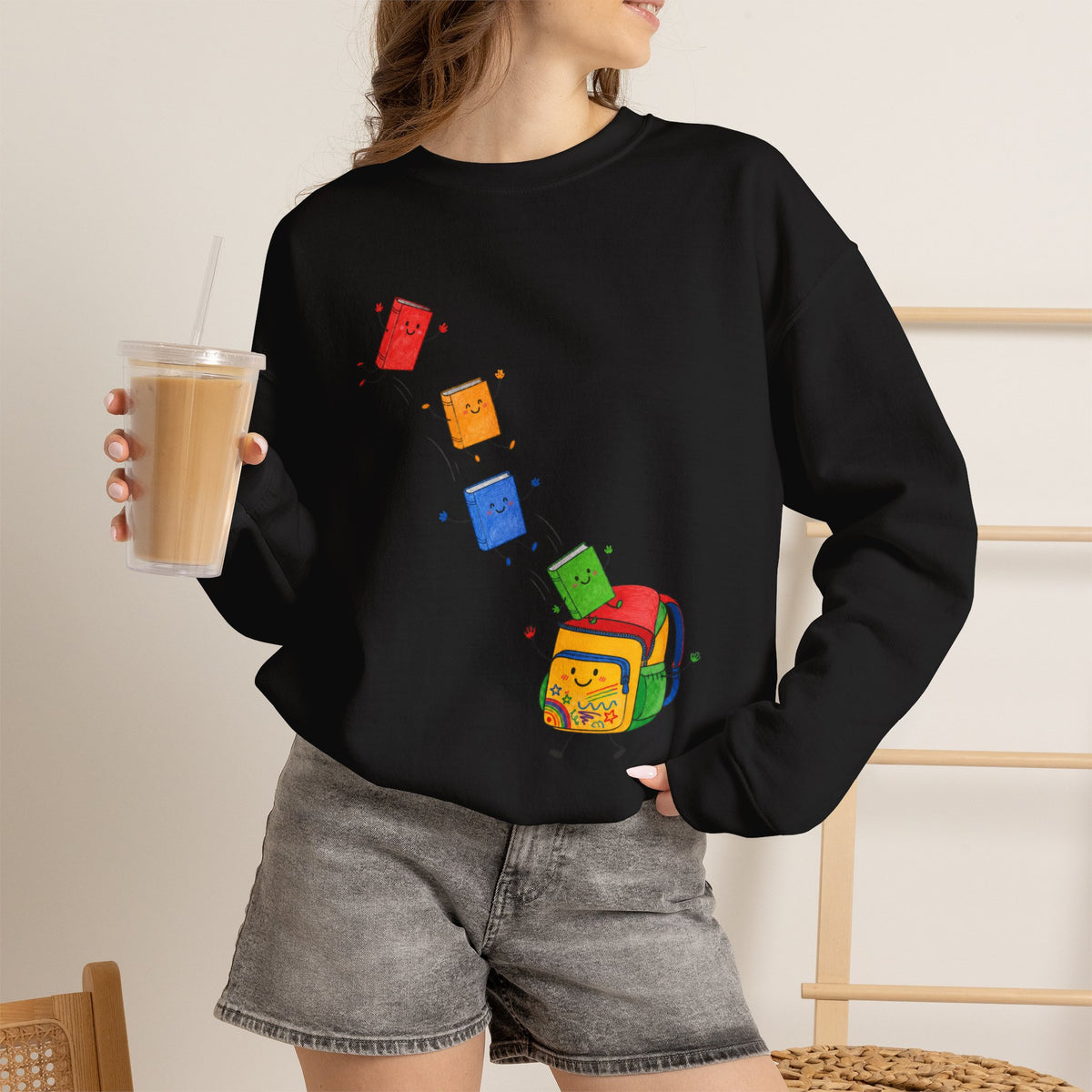 Teacher Backpack and Falling Books Crewneck Sweatshirt — Cute School Supplies Graphic