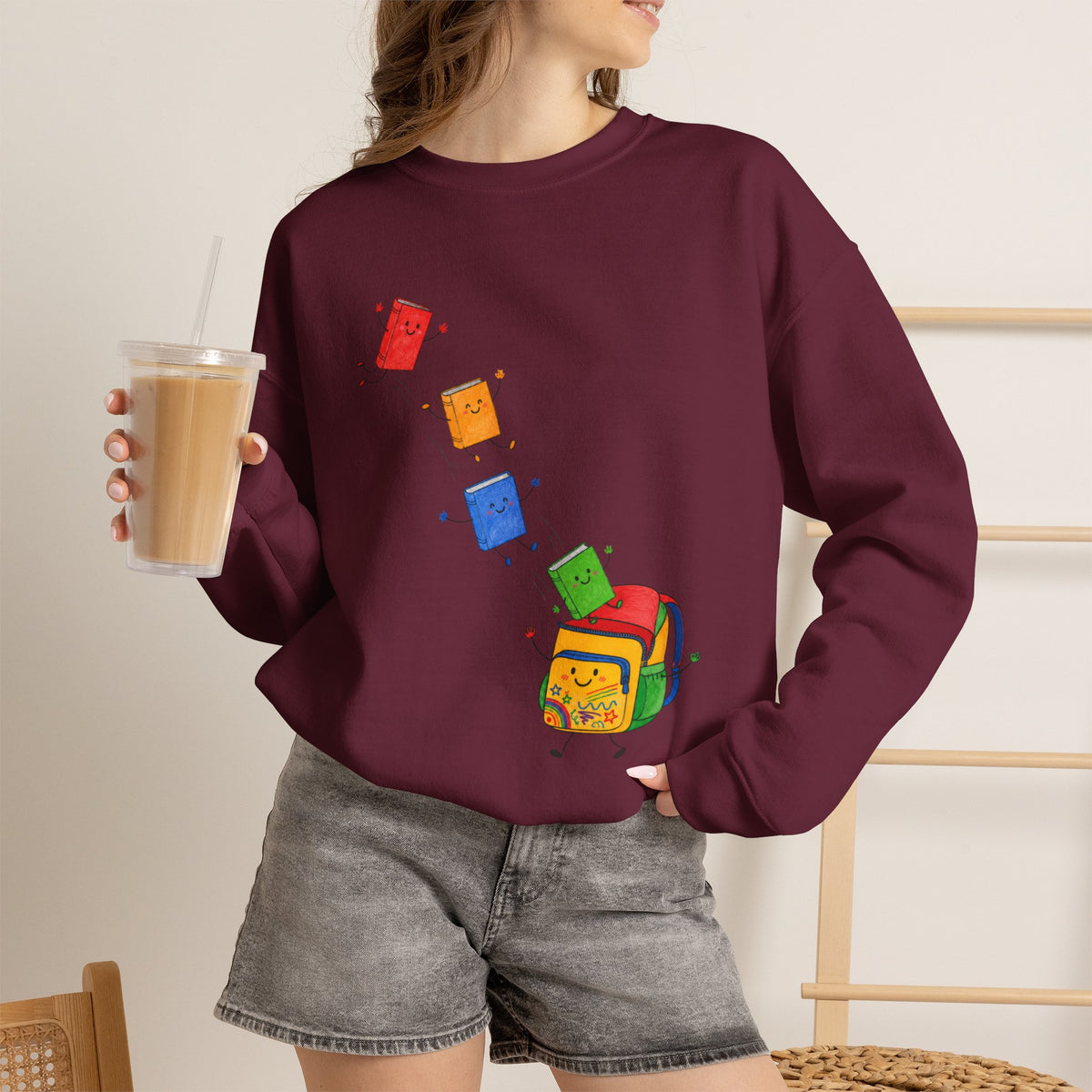 Teacher Backpack and Falling Books Crewneck Sweatshirt — Cute School Supplies Graphic